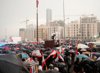 Protests in Beirut, with demonstrators demanding their rights while it rains (Eva Mahfouz)