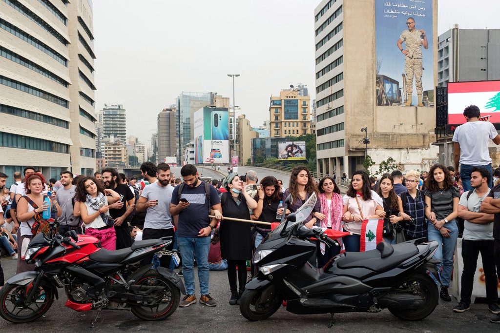 Protesters hold the line at a roadblock on the Ring Bridge in Beirut during the early days of the protests. (Rita Kabalan / Foreign Policy). Not violent article
