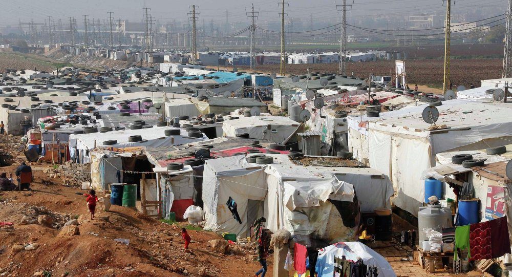 Wide shot of a refugee camp, where refugees continue to live under worsening conditions. (The961)