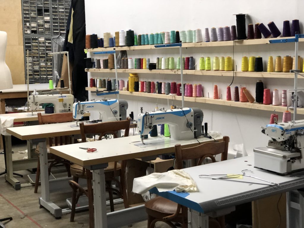 Threads of all colours and sewing machines line the walls of Creative Space Beirut. (Lynn Cheikh Moussa)