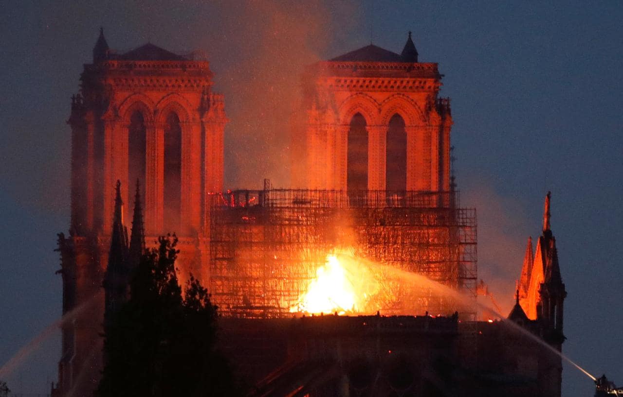 Fire shrouds the Notre-Dame Cathedral in France. (Telegraph