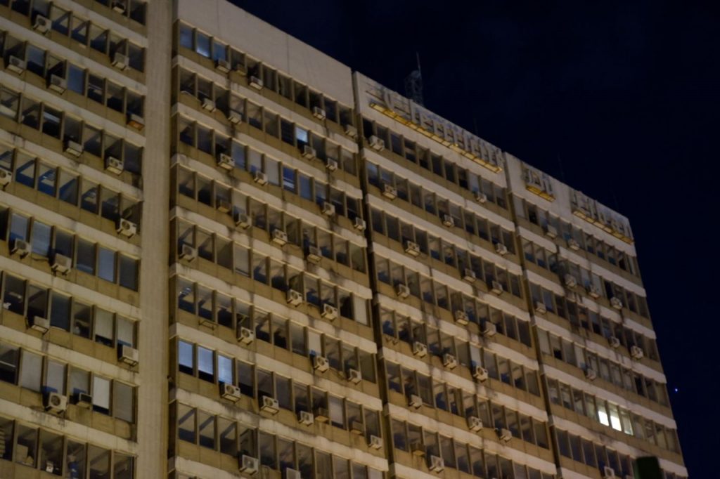 Electricite du Liban, a public agency, operates outside Parliament control and is still not covered by the central government’s budget process. Photo shows the logo of the building in the evening. (Firas El Khoury)