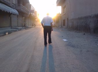 Man walking in Raqqah | August 2012. (Beshr Abdulhadi)