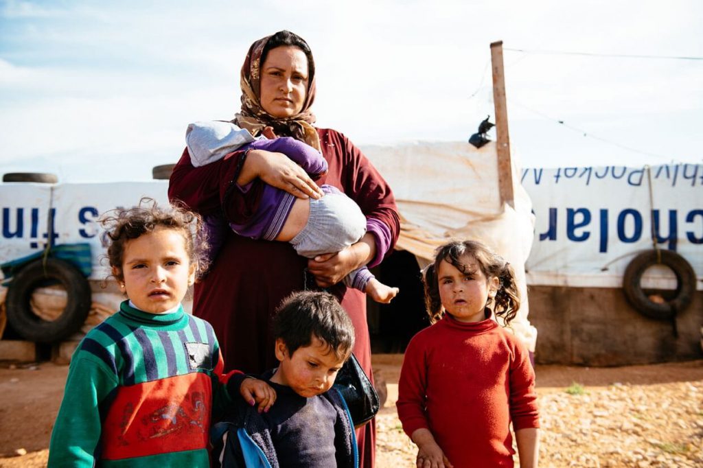 Mariam and her family, refugees in Lebanon. (Mercy Corps | Corinna Robbins)