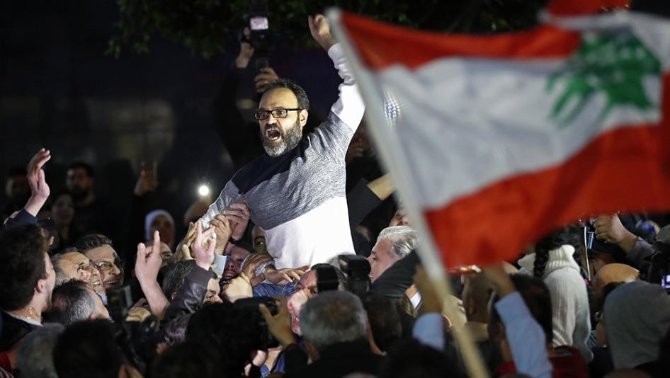 Lebanese actor Ziad Itani being carried after his release in 2018. (AP Photo | Hussein Malla)