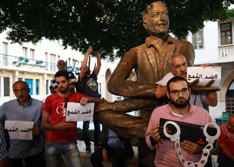 Activists in downtown Beirut protesting against the interrogation of individuals making political comments on social media. (The Arab Weekly | AFP)