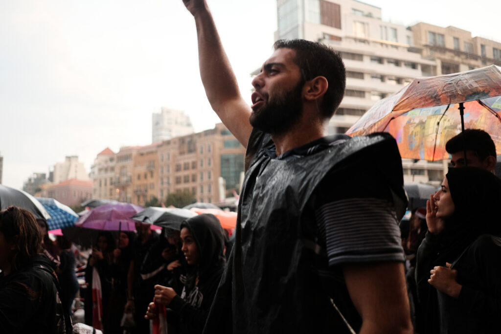 Protests in Beirut, with demonstrators demanding their rights while it rains (Eva Mahfouz)
