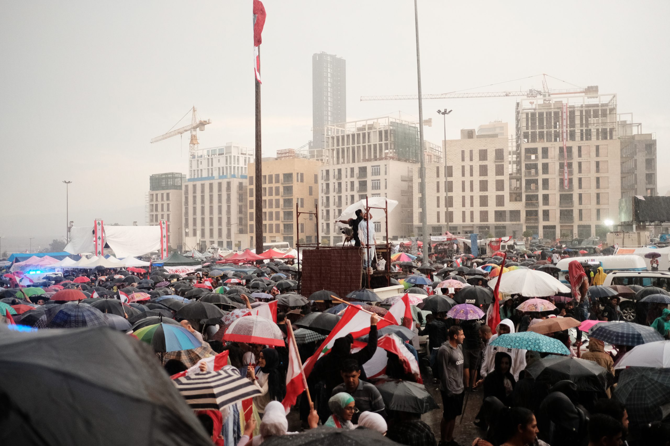 Protests in Beirut, with demonstrators demanding their rights while it rains (Eva Mahfouz)