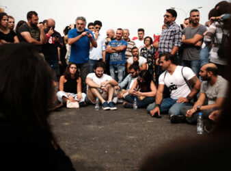 During the protests, several University professors gave their classes on the streets. On the Jbeil highway, Dr. Sharif Abdunnur, media ethics professor in LAU and AUT, gives an open class lecture and discussion on the importance of a technocratic government. (Eva Mahfouz)