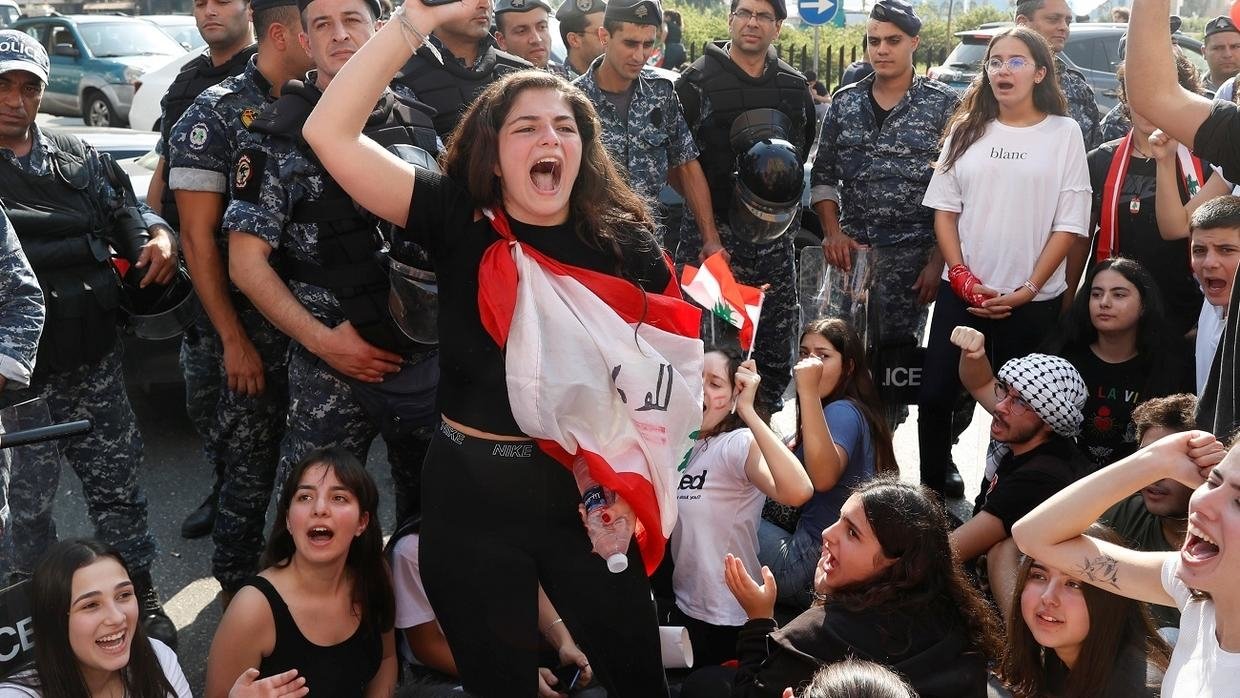 A university student gestures during an anti-government protest in Beirut. (Goran Tomasevic | Reuters)