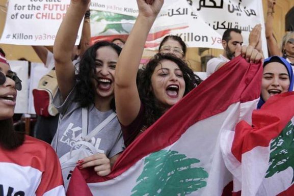 Women protest as part of the October 17 Revolution (AP / Hassan Ammar)