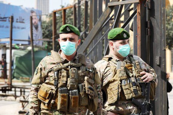 Lebanese soldiers standing guard in the Beirut's downtown district on March 15.(Arab News via AFP) Medical emergency article