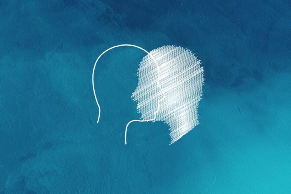 Mental health article visual, outline of a face facing the insides of the face against a blue, watery background