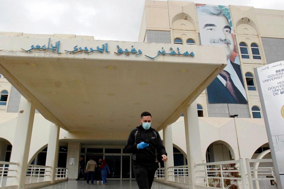 Entrance to the Rafik Hariri University Hospital, the main public hospital where coronavirus is being treated in Lebanon. (The National via EPA / Wael Hamzeh) medical workers / nurses article