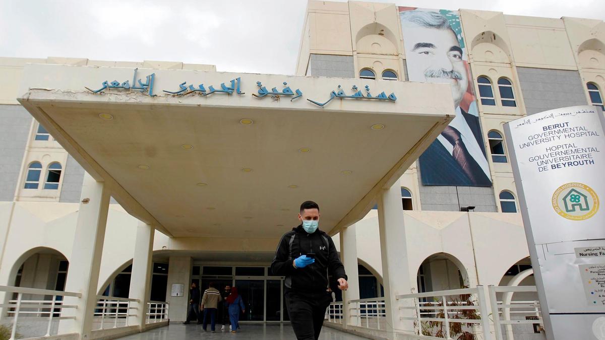 Entrance to the Rafik Hariri University Hospital, the main public hospital where coronavirus is being treated in Lebanon. (The National via EPA / Wael Hamzeh) medical workers / nurses article