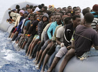 (PHOTO: Sputnik News via AFP / Abdullah Elgamoud) migrants and migration in Europe article