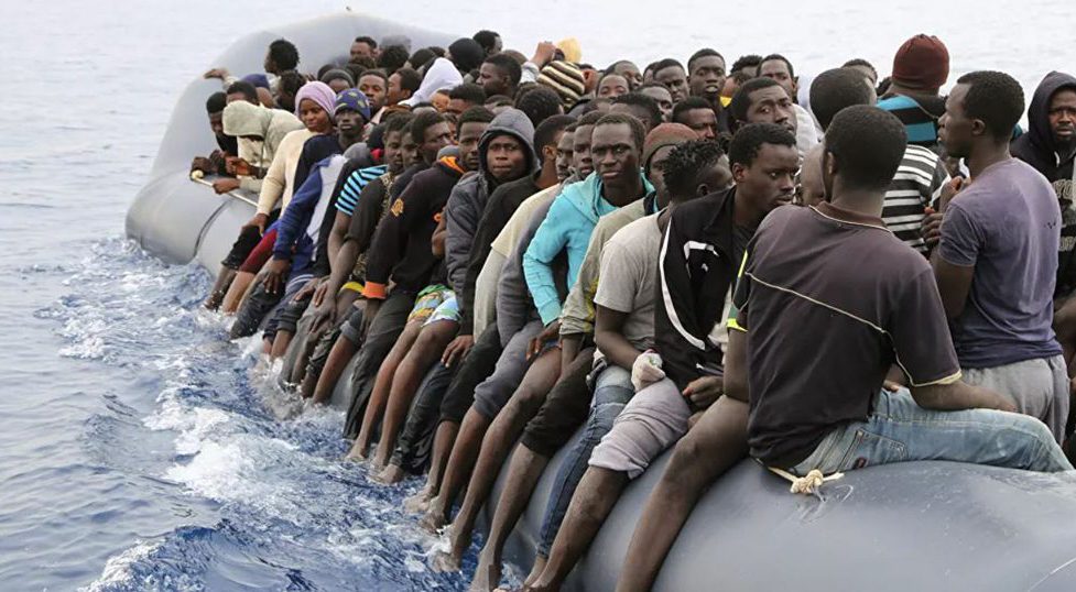 (PHOTO: Sputnik News via AFP / Abdullah Elgamoud) migrants and migration in Europe article