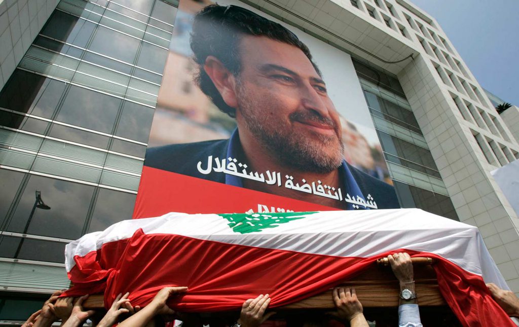 Friends and relatives carry the coffin of slain Lebanese journalist Samir Kassir in Beirut in June, 2005. (AP Photo / Hussein Malla)