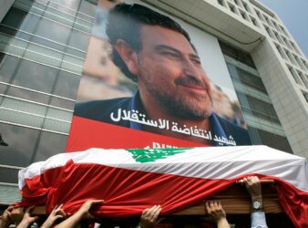 Friends and relatives carry the coffin of slain Lebanese journalist Samir Kassir in Beirut in June, 2005. (AP Photo / Hussein Malla)