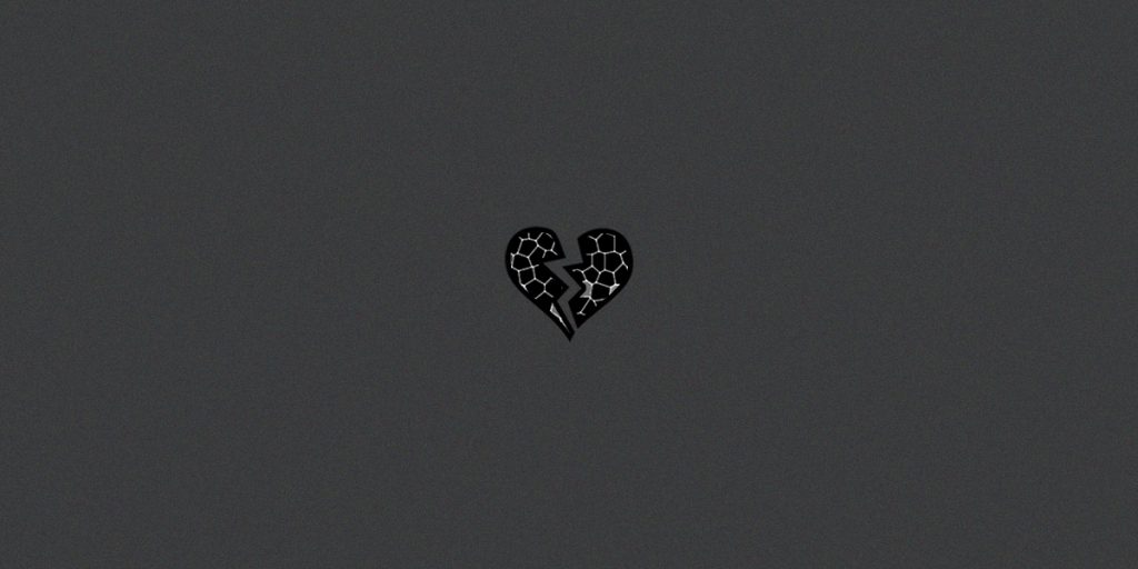 Beirut explosion - Collective trauma - Black glass-stained heart over grey background