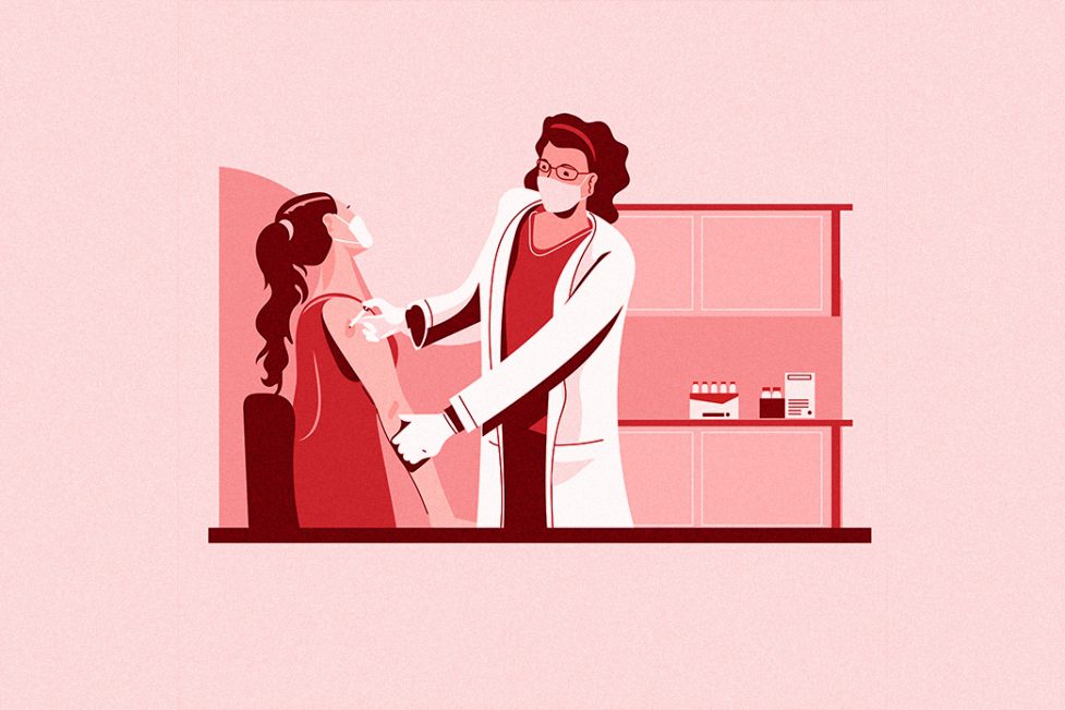 Doctor wearing face medical mask doing injection of virus vaccine to seated patient