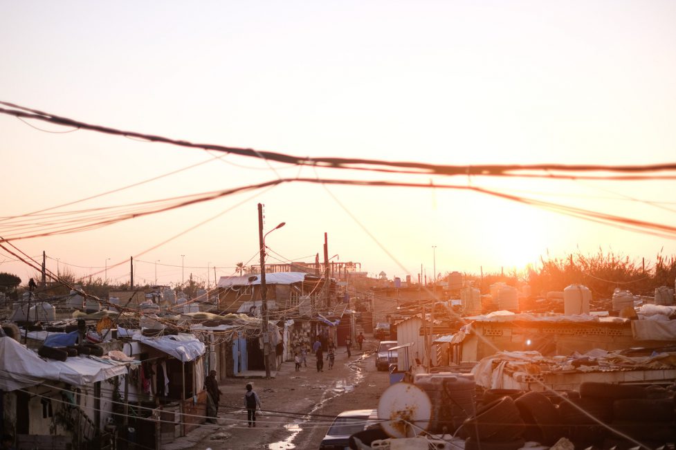 The sun sets over Hay el Tanak, Tripoli. February 1, 2021. Photo: Victoria C. Werling / victoriawerling.com
