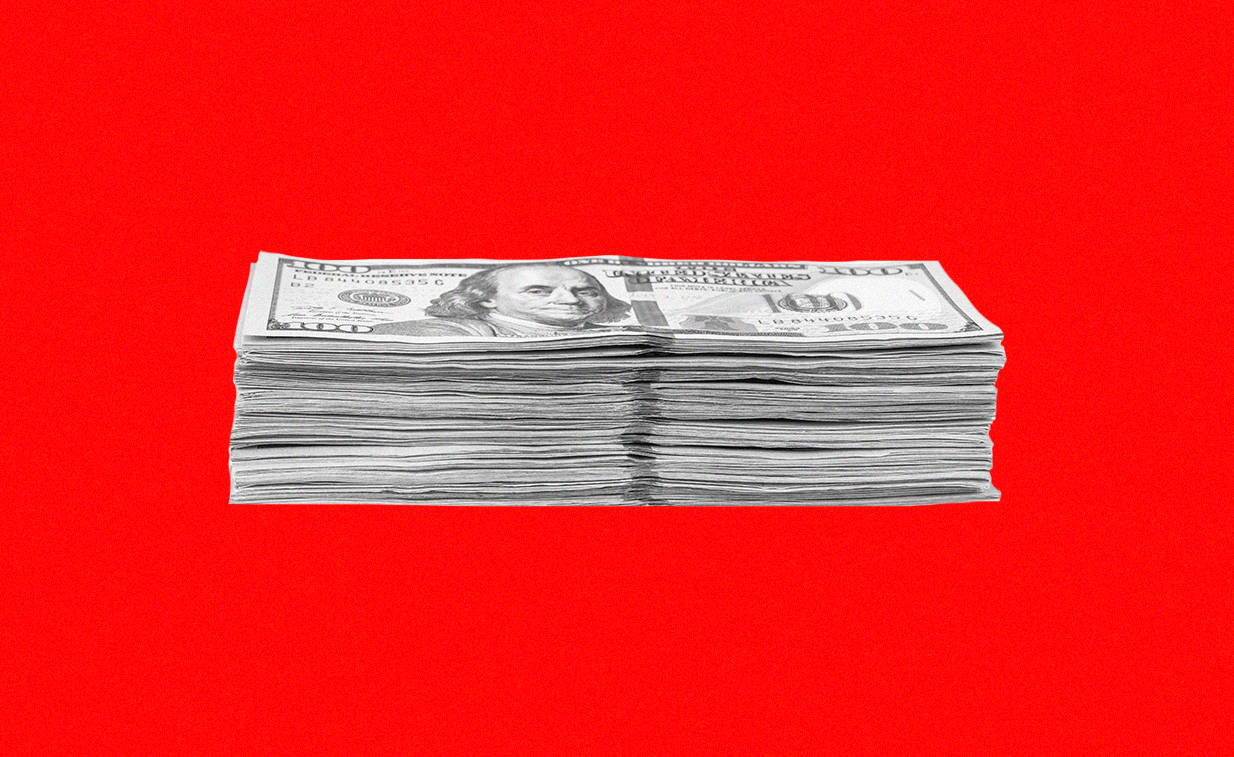 Stack of dollars against a red background