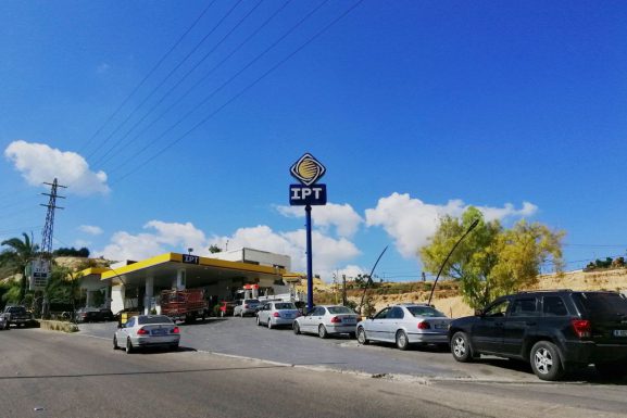 Cars line up outside of an IPT gas station in Lebanon as they wait for their turn to fill up on fuel