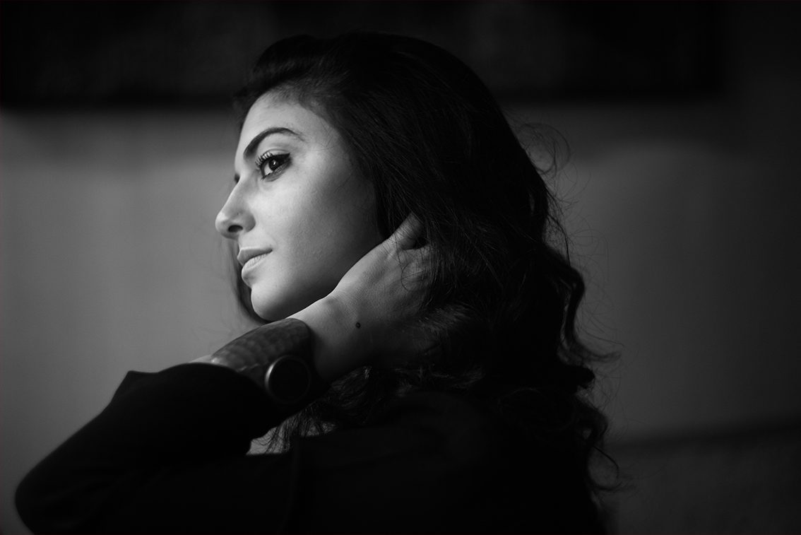 Headshot of Mounia Akl in black and white