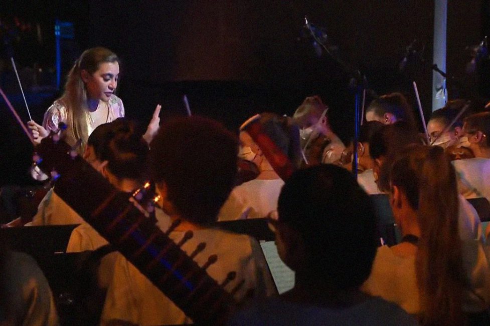 Lebanese conductor Yasmina Sabbah leads the Firdaus Women's Orchestra at the Expo 2020 opening ceremony.