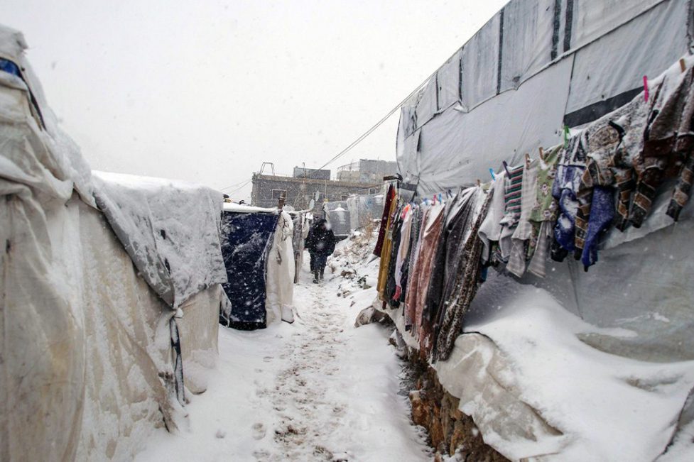 Syrian Refuge Camp at Syria Lebanon Borders at time of a blizzard in 2021. (Photo: Hussein Kassir / Alamy Stock)
