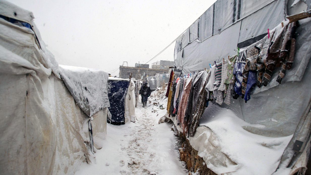 Syrian Refuge Camp at Syria Lebanon Borders at time of a blizzard in 2021. (Photo: Hussein Kassir / Alamy Stock)