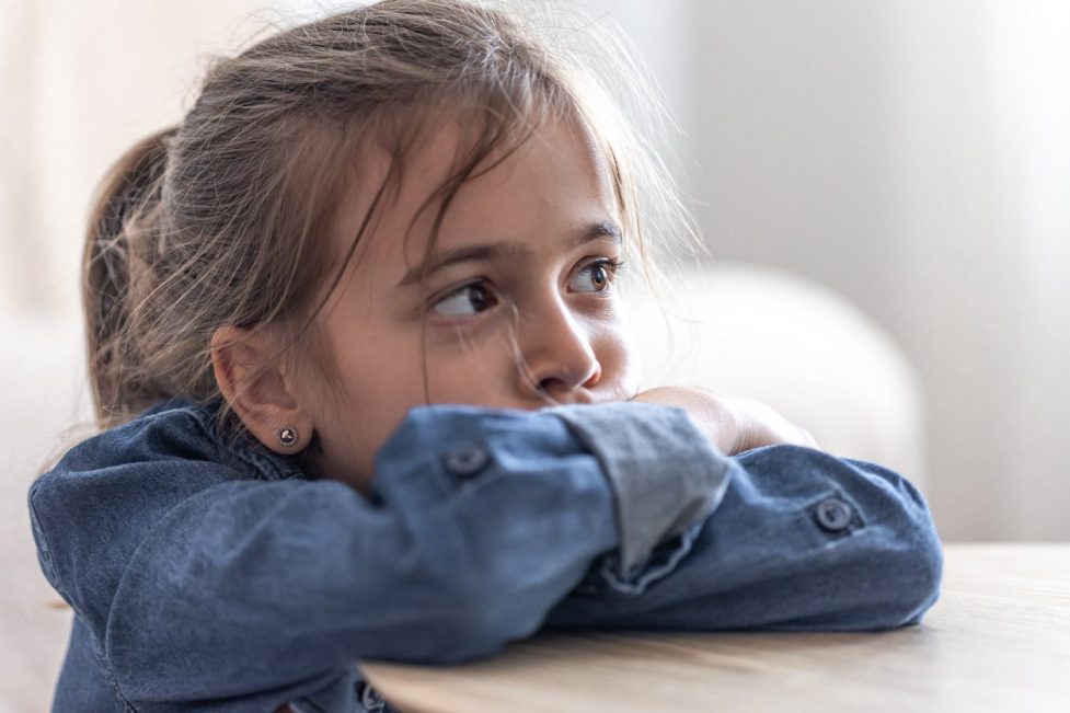 Photo of child leaning against a table. In October, 53 percent of families surveyed by UNICEF in Lebanon had at least one child who skipped a meal for lack of food in the house.